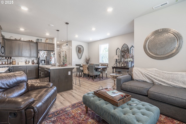 1850 NW Landon St, Mcminnville, OR 97128 - living room featuring light wood finished floors and recessed lighting