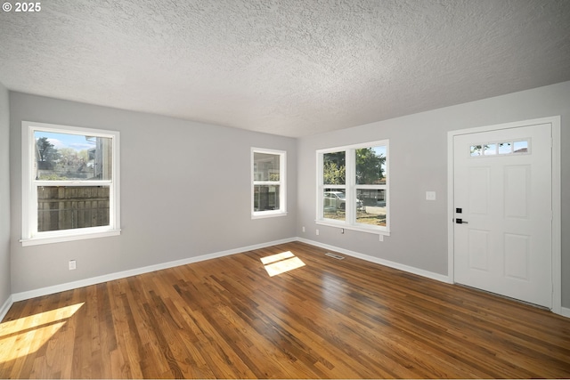 320 SE 106th Ave, Portland, OR 97216 - entryway with a textured ceiling and wood finished floors