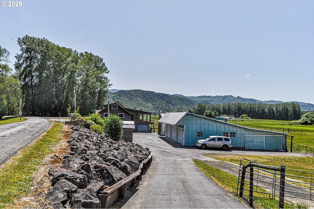 77993 Point Adams Rd, Clatskanie, OR 97016 - view of asphalt driveway featuring a mountain view