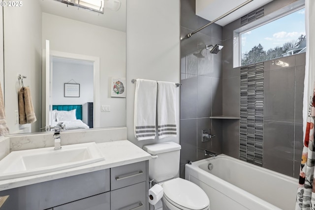 full bath with toilet, vanity, ensuite bath, and shower / bath combo with shower curtain