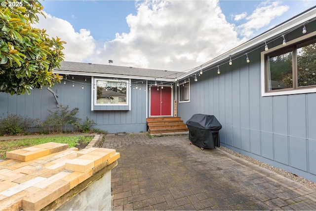 property entrance featuring a patio