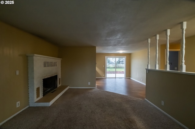 unfurnished living room with carpet