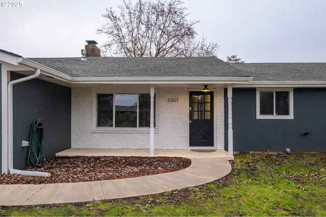 entrance to property with covered porch