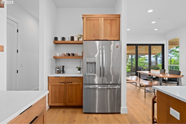 9316 NW Hardy Ave, Portland, OR 97231 - kitchen with stainless steel fridge, recessed lighting, light countertops, light wood finished floors, and open shelves