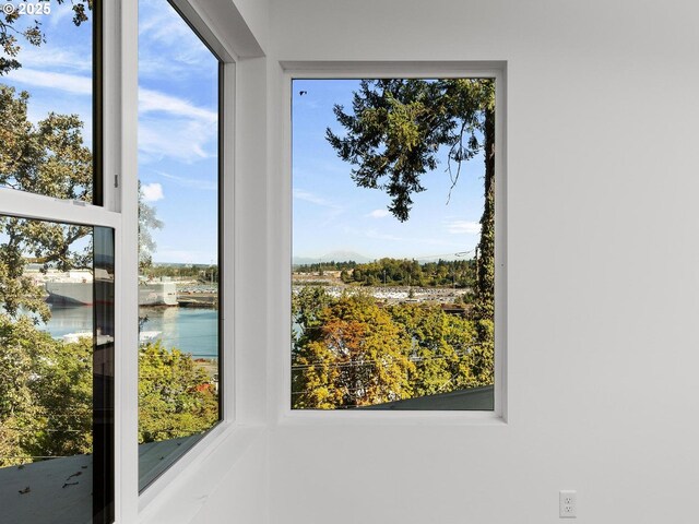 interior space featuring a water view