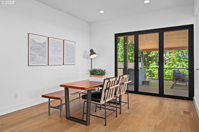 9316 NW Hardy Ave, Portland, OR 97231 - dining space featuring light wood-style floors, baseboards, and recessed lighting