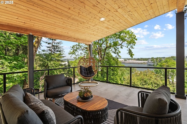 9316 NW Hardy Ave, Portland, OR 97231 - view of patio / terrace featuring a water view, an outdoor living space, and a balcony