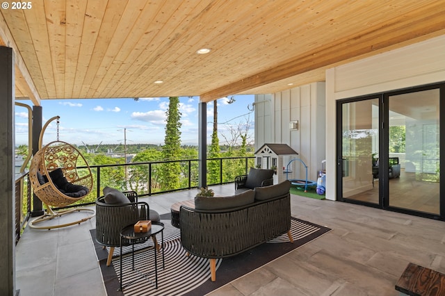9316 NW Hardy Ave, Portland, OR 97231 - view of patio / terrace with an outdoor living space and a balcony