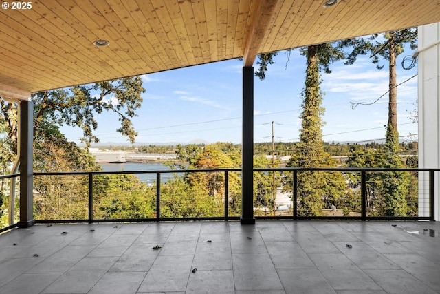 view of patio / terrace with a water view