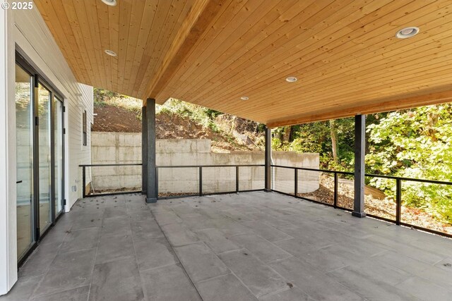 view of patio featuring fence