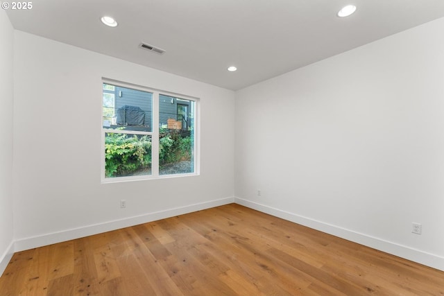 9316 NW Hardy Ave, Portland, OR 97231 - spare room with baseboards, light wood-type flooring, and recessed lighting