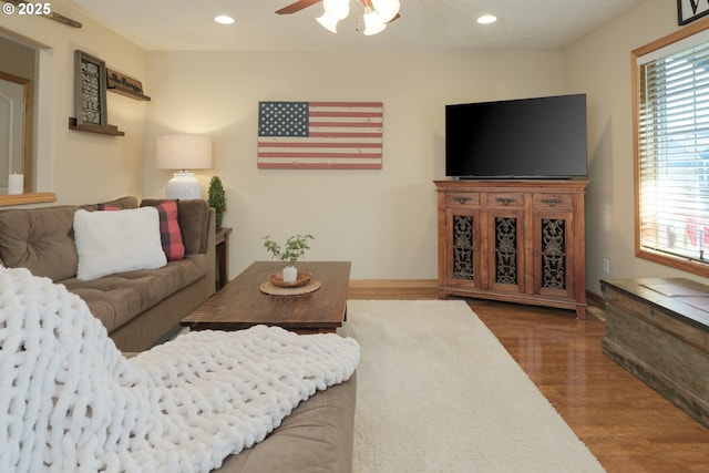 living room featuring a wealth of natural light, recessed lighting, wood finished floors, and a ceiling fan