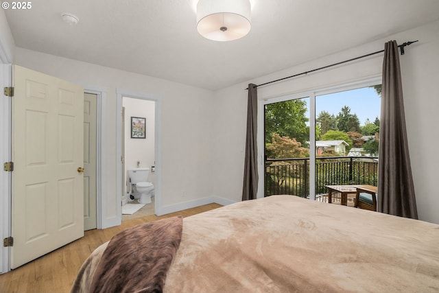 20060 SW Clarion St, Beaverton, OR 97003 - bedroom with access to outside, light wood finished floors, and ensuite bath