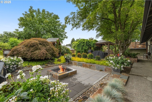 20060 SW Clarion St, Beaverton, OR 97003 - view of patio / terrace featuring a fire pit and a gazebo
