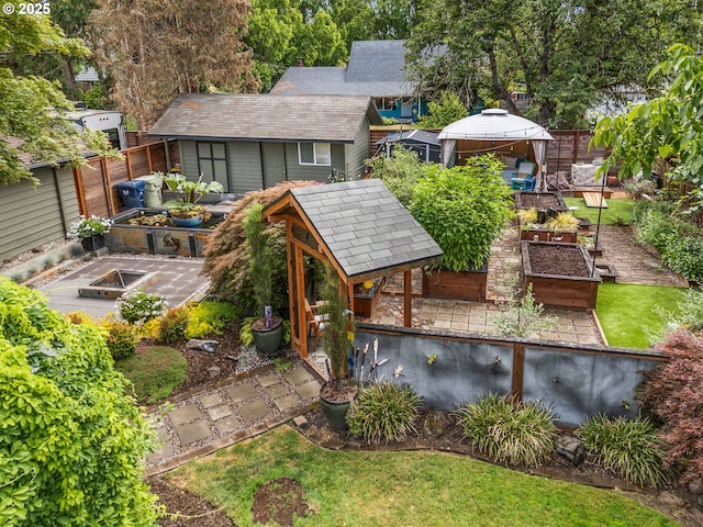 20060 SW Clarion St, Beaverton, OR 97003 - rear view of house featuring a garden, a gazebo, and an outdoor structure