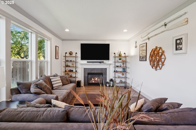 3753 NW Talamore Ter, Portland, OR 97229 - living room featuring a tile fireplace, recessed lighting, and ornamental molding