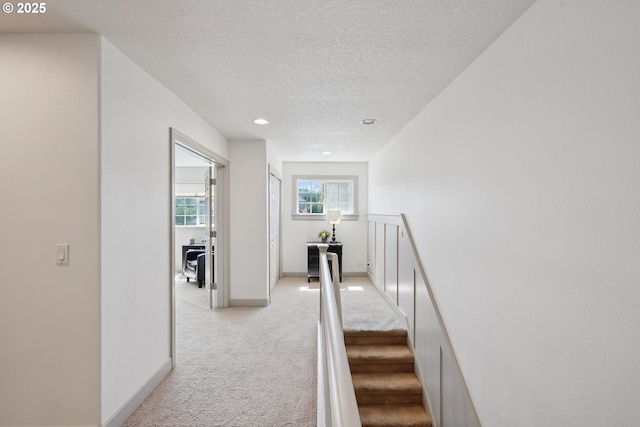 3753 NW Talamore Ter, Portland, OR 97229 - stairs with carpet and a textured ceiling