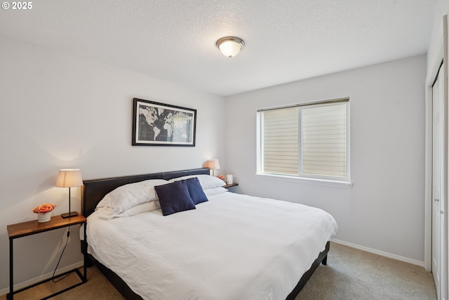 3753 NW Talamore Ter, Portland, OR 97229 - carpeted bedroom featuring a textured ceiling and a closet