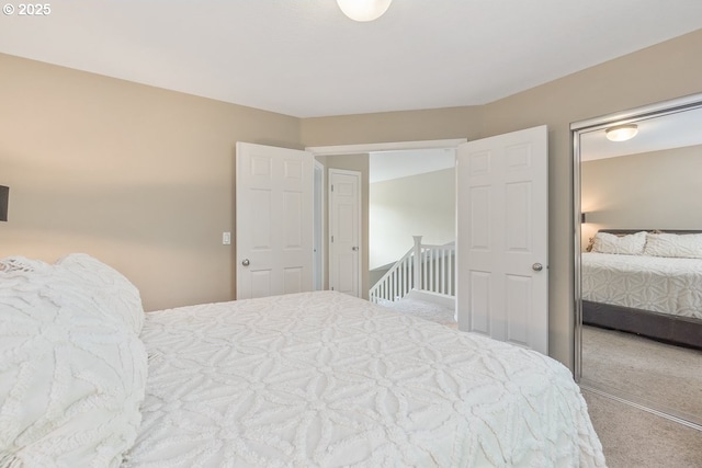bedroom featuring carpet