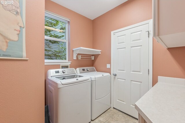 laundry room featuring laundry area and separate washer and dryer