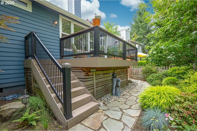 wooden deck featuring stairs