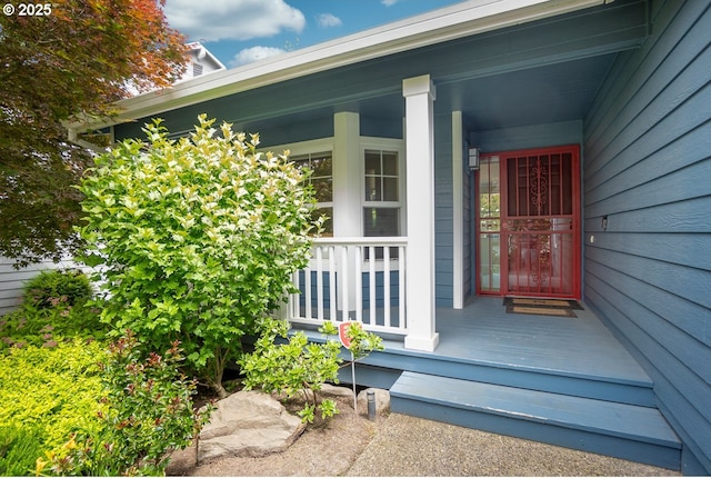 doorway to property with covered porch