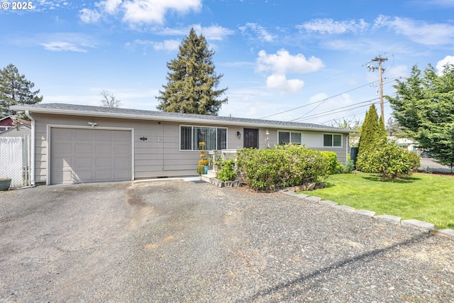 1592 NW Keasey St, Roseburg, OR 97471 - single story home with a front yard, an attached garage, fence, and driveway