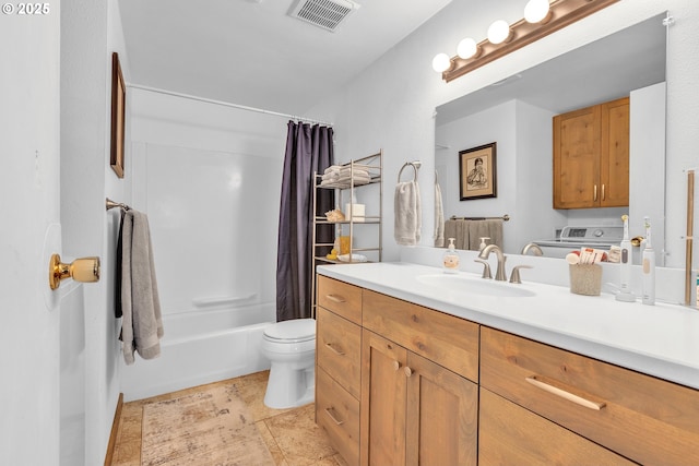 1592 NW Keasey St, Roseburg, OR 97471 - bathroom featuring vanity, shower / tub combo with curtain, toilet, visible vents, and washing machine and clothes dryer
