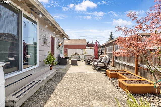 1592 NW Keasey St, Roseburg, OR 97471 - view of patio / terrace featuring an outdoor living space with a fire pit and fence private yard
