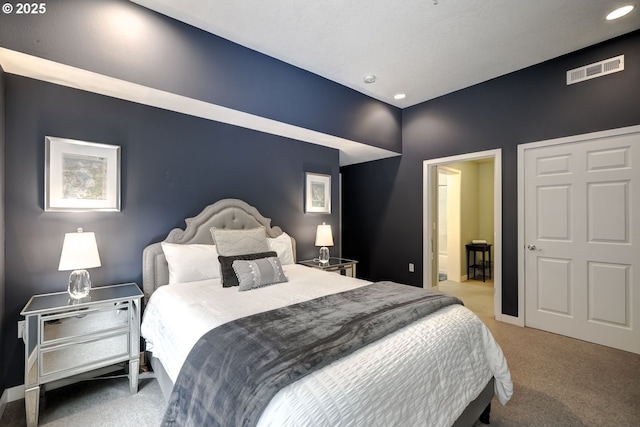 bedroom with recessed lighting, visible vents, and light colored carpet