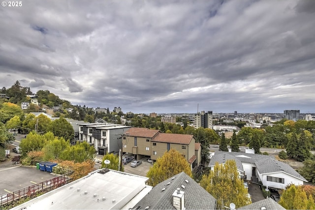 birds eye view of property featuring a view of city