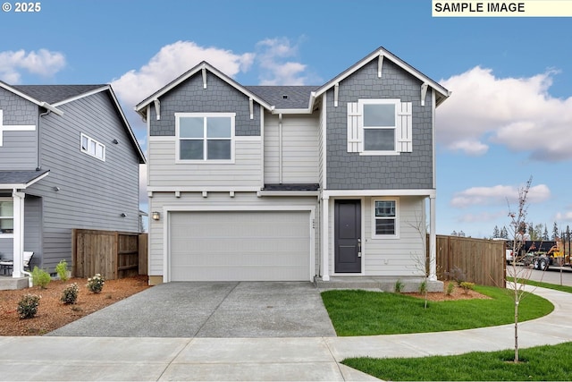 view of front of property featuring a garage