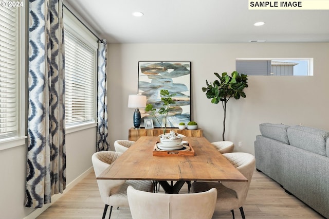 dining room featuring light hardwood / wood-style flooring