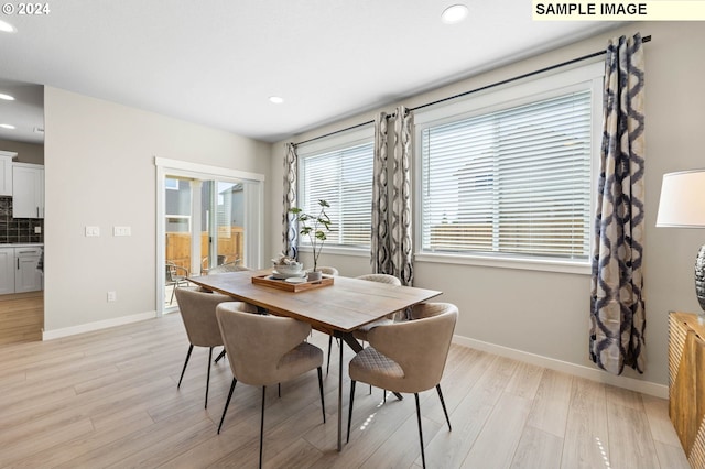 dining space featuring light hardwood / wood-style flooring