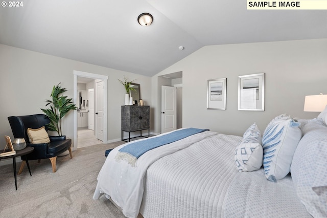 carpeted bedroom featuring lofted ceiling