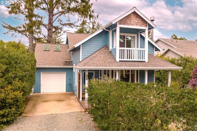 9180 Windward Ln, Manzanita, OR 97130 - view of front of house featuring gravel driveway, a porch, and roof with shingles