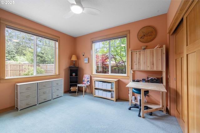 9180 Windward Ln, Manzanita, OR 97130 - office with plenty of natural light, light carpet, and a ceiling fan