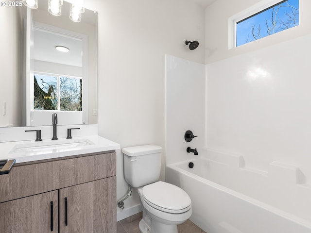 full bathroom with shower / tub combination, vanity, and toilet