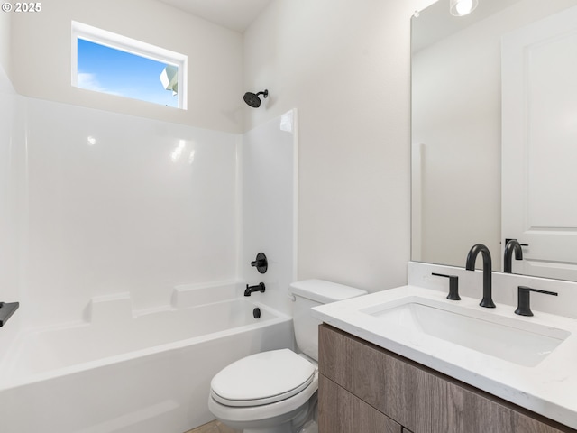 full bathroom featuring vanity, tub / shower combination, and toilet