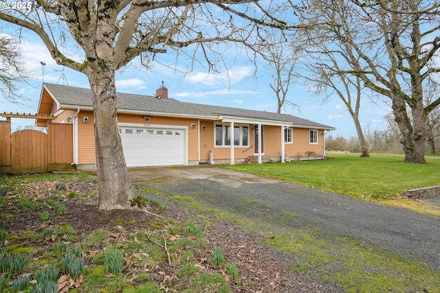 30596 Horseshoe Dr, Albany, OR 97321 - single story home with a chimney, a front lawn, driveway, fence, and a garage