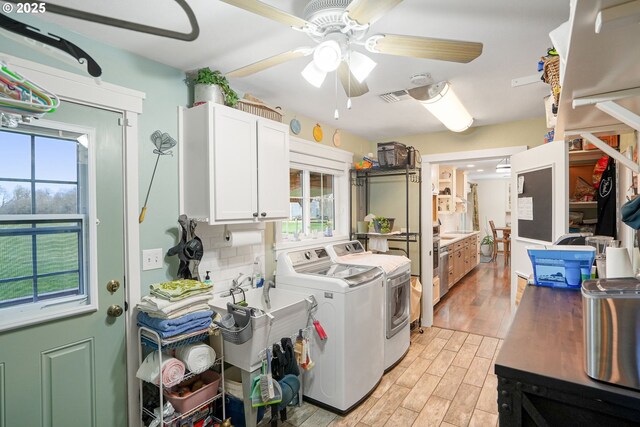 30596 Horseshoe Dr, Albany, OR 97321 - laundry room featuring light wood finished floors, visible vents, washer and clothes dryer, and ceiling fan