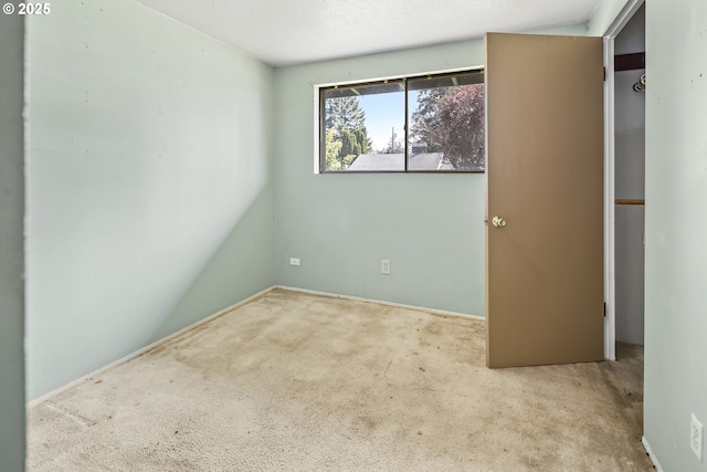 unfurnished bedroom featuring carpet flooring