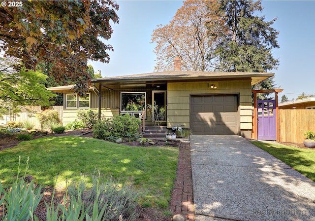 view of front of property with a front lawn, fence, a chimney, concrete driveway, and an attached garage