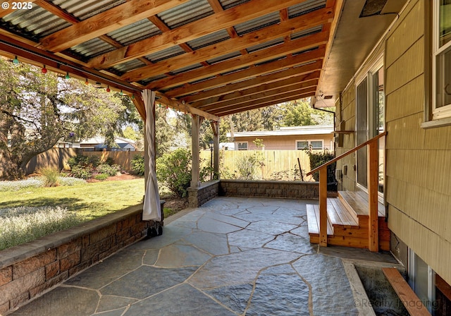 view of patio / terrace with a fenced backyard and entry steps