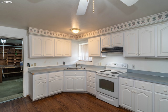 471 Hawthorne St, Sutherlin, OR 97479 - kitchen featuring white electric range, a sink, under cabinet range hood, and white cabinets