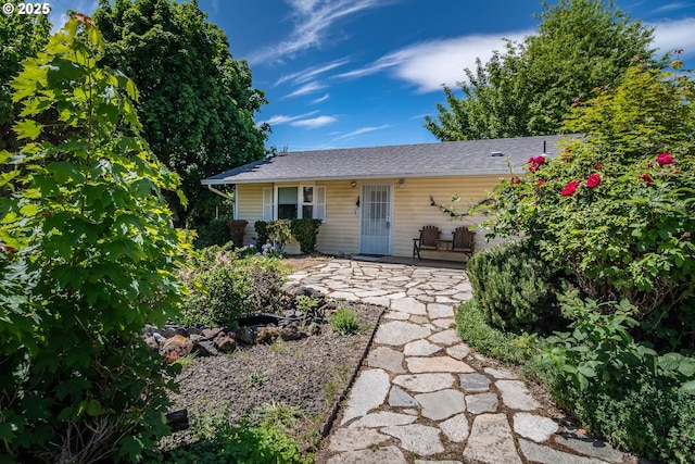 471 Hawthorne St, Sutherlin, OR 97479 - view of front of house with a shingled roof and a patio area