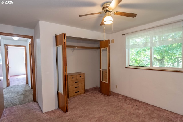 471 Hawthorne St, Sutherlin, OR 97479 - unfurnished bedroom featuring light colored carpet, a closet, and a ceiling fan
