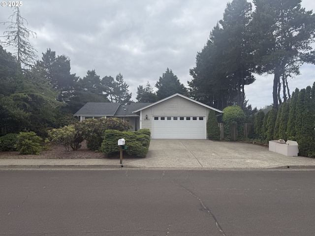 2040 40th St, Florence, OR 97439 - ranch-style house featuring an attached garage and driveway