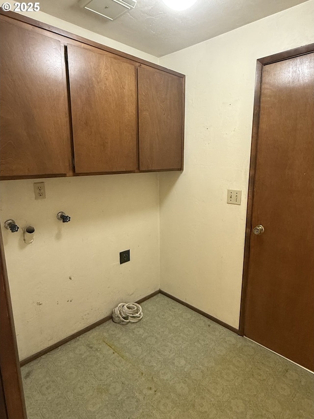 2040 40th St, Florence, OR 97439 - laundry room featuring cabinet space and carpet flooring
