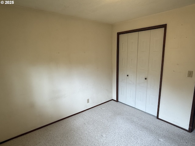 2040 40th St, Florence, OR 97439 - unfurnished bedroom with a closet and carpet
